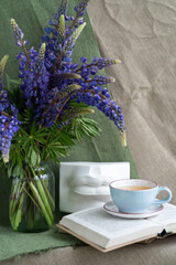 Still life with flowers. Lupins. Greeting card for the holiday. Background.