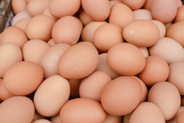chicken eggs on wooden tray put to sell in the market