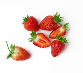 Obraz na płótnie Canvas whole and halves of fresh ripe red strawberries