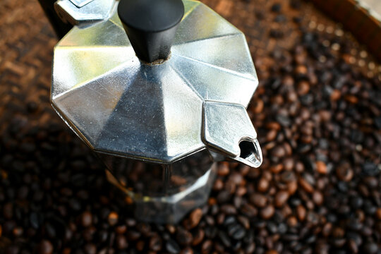 mokapot  coffee at home have beans be back groud