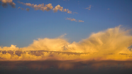 incredibly beautiful colorful clouds at dawn, summer