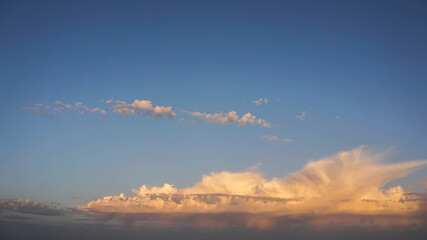 incredibly beautiful colorful clouds at dawn, summer