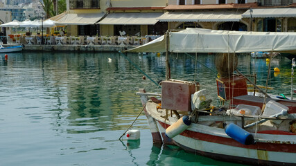 Fototapeta na wymiar boats in a port in a Greek city in Crete