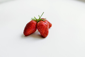 
Red strawberries on a white background. Natural eco-product.