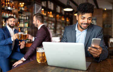 Young business man having a break in a restaurant. Work occupation business lifestyle concept