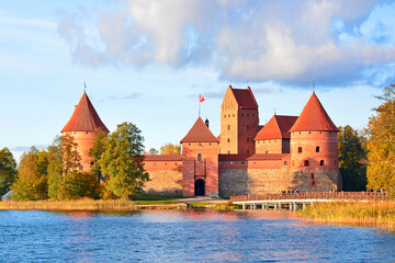 Naklejka na ściany i meble Medieval red brick castle on island in Trakai, Lithuania.