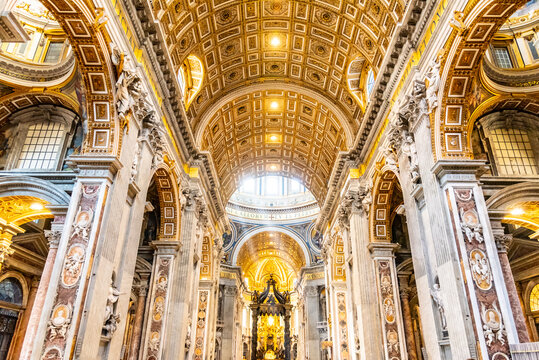 VATICAN CITY - MAY 07, 2019: Ray of light in interior of the Saint Peters Basilica, Vatican in Rome, Italy