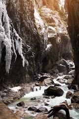 Snow-covered icicles at Partnachklamm, famous tourist destination. Partnachklamm in Garmisch-Partenkirchen, Bavaria