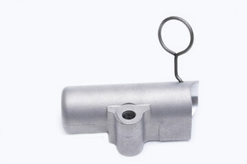 Tension mechanism roller of a timing belt of an internal combustion engine on a white background. The concept of new spare parts and maintenance of vehicles