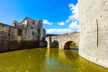 The walls and moat with water