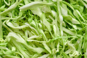 Slaw green cabbage macro image, shredded salad.
