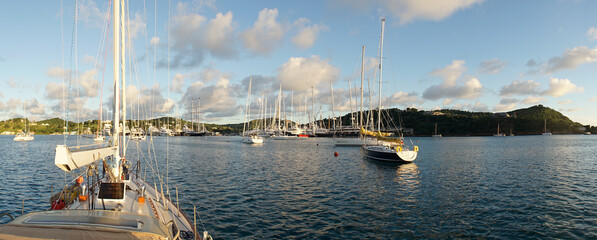 Yacht sail boats anchored on the shore in Antigua in the Caribbean island nation Antigua and...