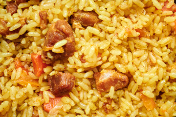 Macro photo of pilaf, golden rice, asian food.