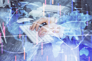 Multi exposure of businessman working on laptop on background. International business hologram in front. Concept of success.