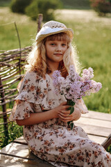 Obraz premium a little girl in a pink dress