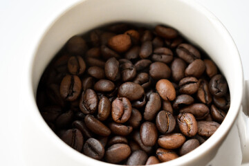 Fototapeta premium coffee beans in a cup