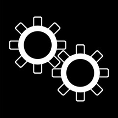 white gears on a black background