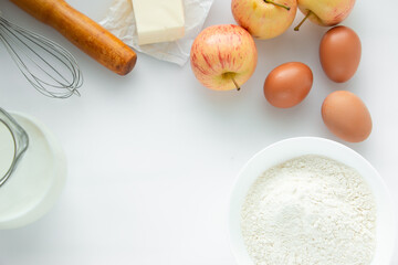 The recipe for making apple pie. Top view, frame made of food ingredients. Copy space for your text.