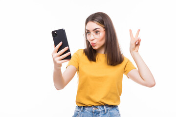 Fototapeta premium Education, technology and internet - young woman browsing in smartphone or have video call isolated on white background