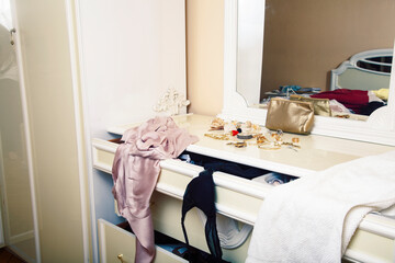 fashion style clothers disorganazed, mess in wardrobe concept