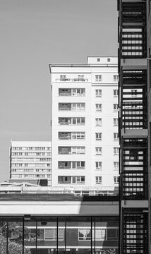 Black and white picture of 2 stacked buildings.