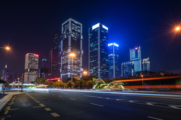 Fototapeta na wymiar Shenzhen Modern Architecture and street traffic light and shadow track