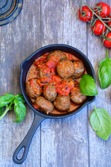 Tasty home made    italian  dish mini  meatballs baked in marinara tomato  sauce