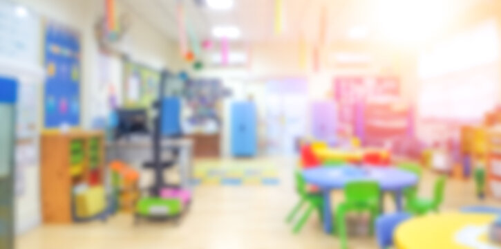 Kindergarten classroom school background. Class room for children students or nursery kids. Blur daycare preschool.