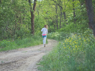 Fototapeta premium Young Female Forest Runner