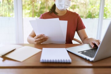 Woman working in cafe wearing protective mask.  coronavirus COVID-19 Social distancing  keep distance in public society people to protect COVID