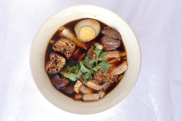 Thai food on white background - Kuay Jab (Chinese roll noodle soup๗