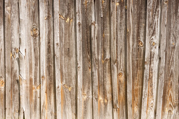 The wall of old wooden boards. Old grunge wooden wall. Close-up, Background