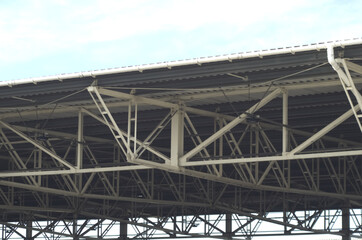 Obraz premium steel roof over blue sky