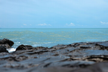 Wave crashing on the rocky reef