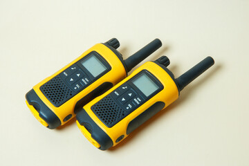 yellow walkie-talkies on a light background