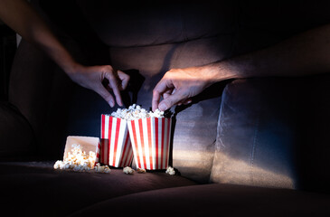 family watching movie keeping social distance