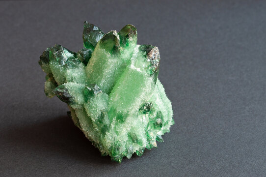 Prenite apophyllite and okenite collection druse. Cape Emerald. on gray background. place for inscription.