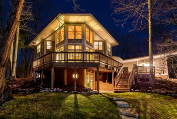 Luxury Home in the Woods at Night © james_pintar