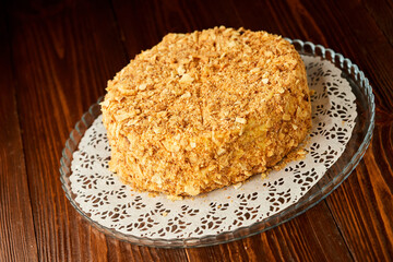 Traditional fresh dessert Napoleon cake on wooden background