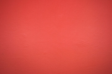 Red concrete wall texture background.