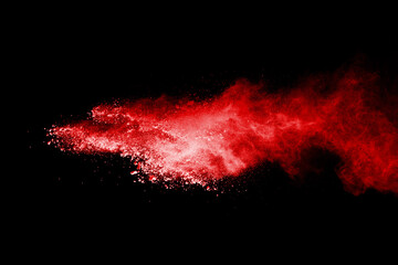 Launched red powder on white background.
