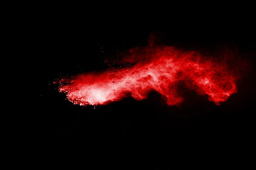 Launched red powder on white background.