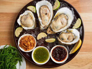 Oysters with Thai-style spicy sauce.
