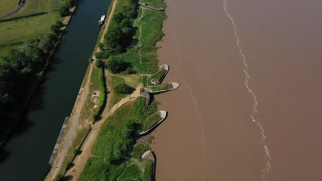 fly over Purton Ship graveyard and Sharpness canal, midday in summer, DJI Mavic drone was used for video