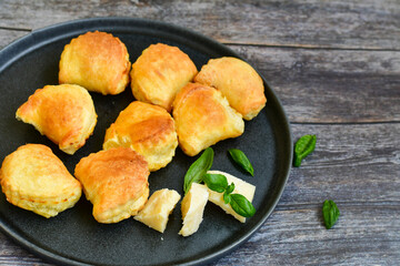 Fresh baked home made  Mini cheese puff pastries.Cheese pie with phyllo pastry and herbs
