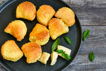 Fresh baked home made  Mini cheese puff pastries.Cheese pie with phyllo pastry and herbs