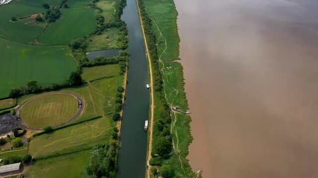fly over Purton Ship graveyard and Sharpness canal, midday in summer, DJI Mavic drone was used for video