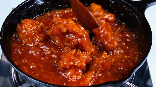 Korean food : Yangnyeom Chicken(Korean fried chicken). Yangnyeom Chicken is mixed with fried chicken made with red pepper paste, tomato sauce, garlic, starch syrup, etc.