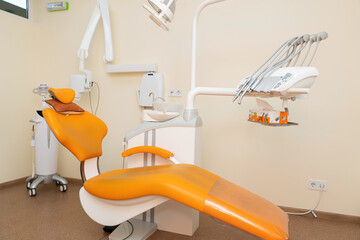 Interior stylish modern dentist office in orange style.