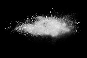 Explosion of white powder isolated on black background. Abstract colored background. holi festival.